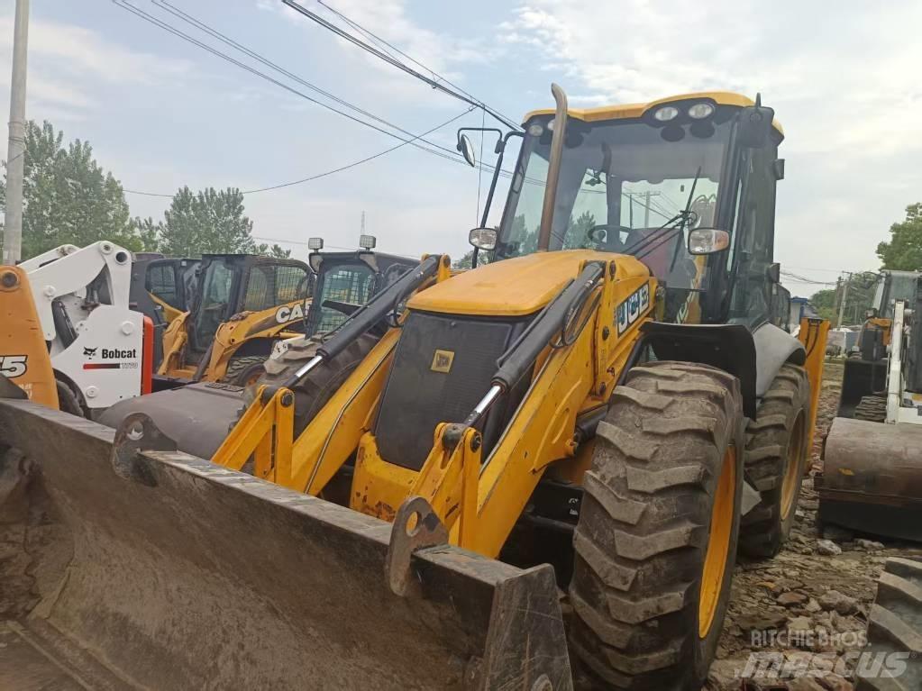 JCB 4CX لوادر ذات جرافات عكسية