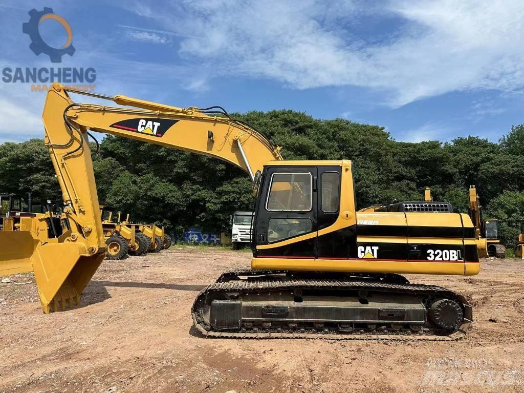 CAT 320 B L حفارات زحافة