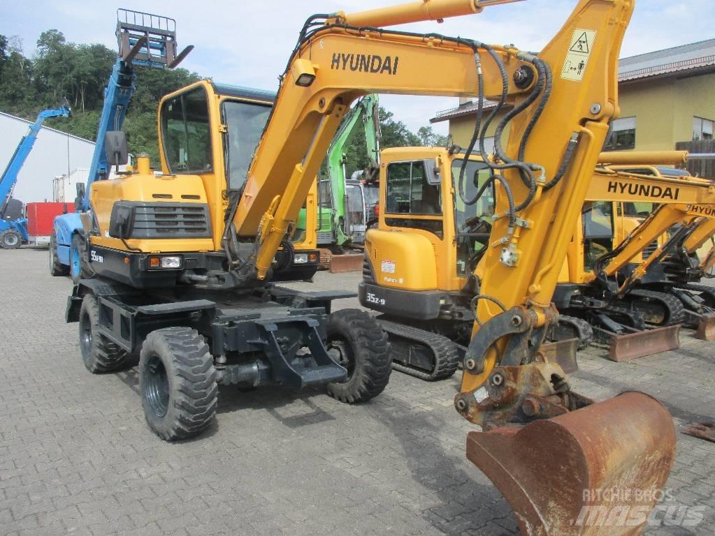 Hyundai Robex 55W-9 حفارات بعجل