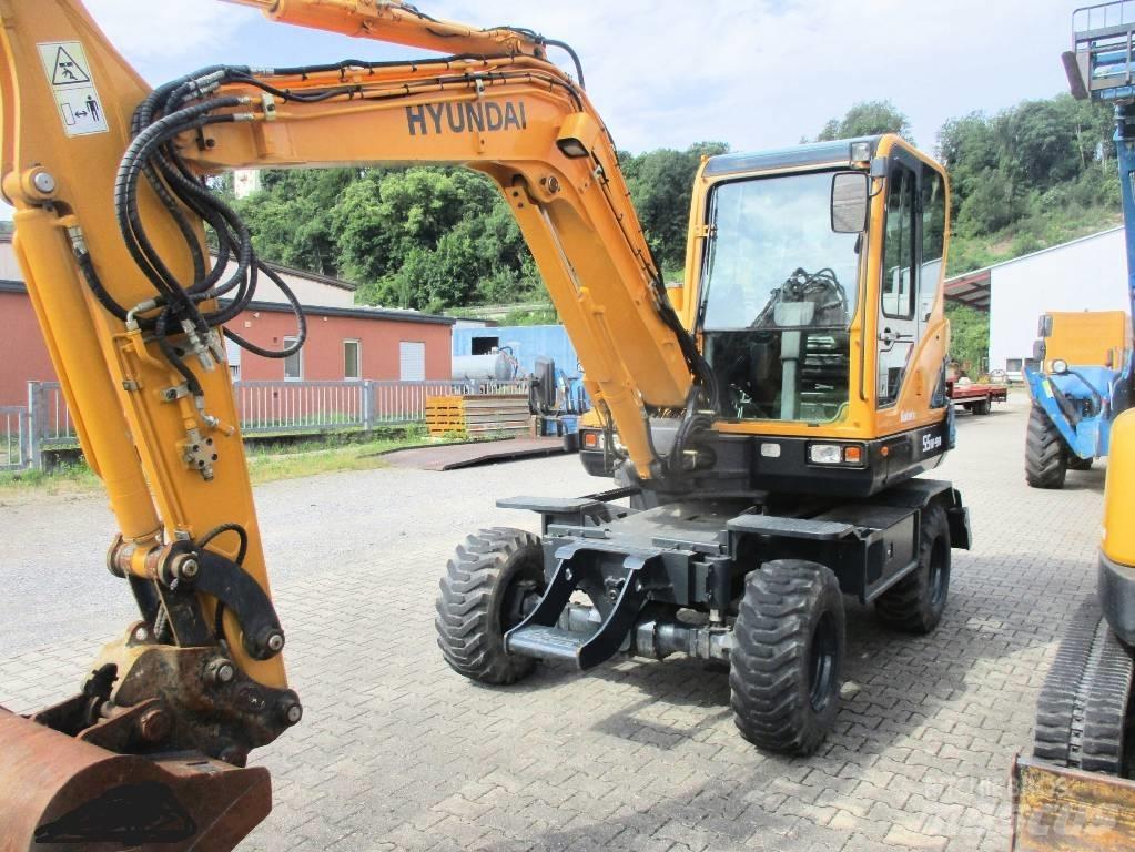 Hyundai Robex 55W-9 حفارات بعجل