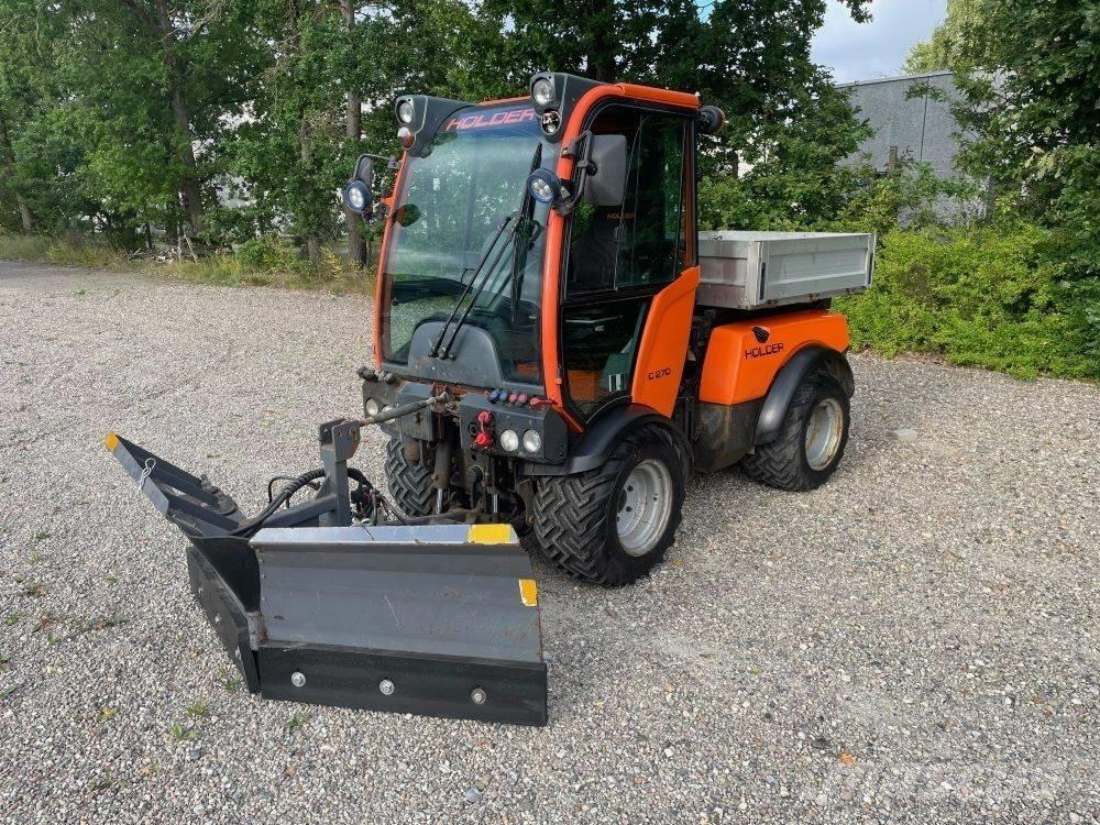 Holder C 270 جرارات مدمجة