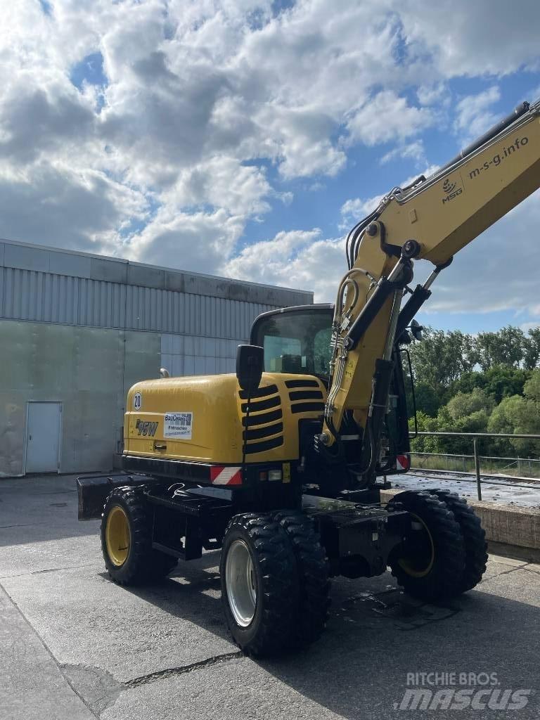 Yanmar B 95 W حفارات بعجل