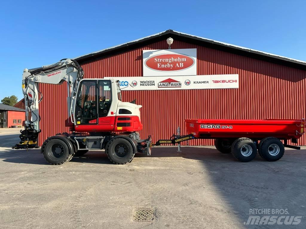 Takeuchi TB 395 W حفارات بعجل