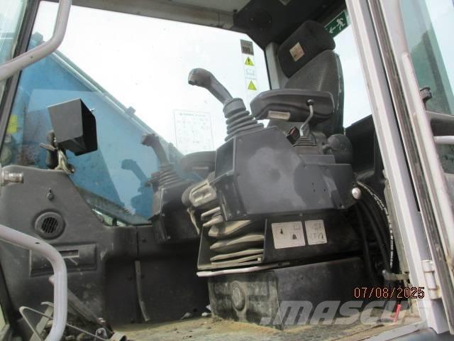 Fuchs MHL 320 مناولات المخلفات / مناولات صناعية