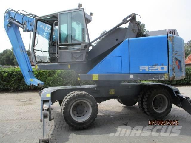 Fuchs MHL 320 مناولات المخلفات / مناولات صناعية