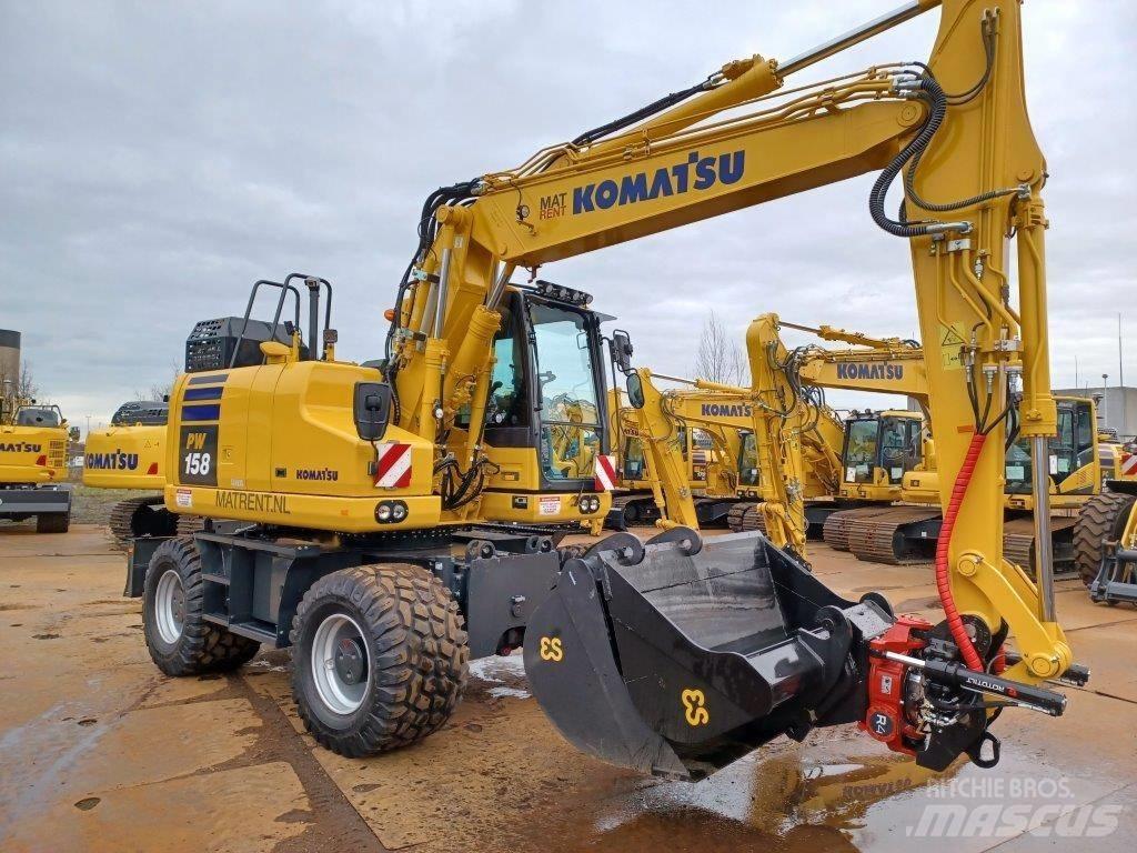 Komatsu PW158-11E0 حفارات بعجل