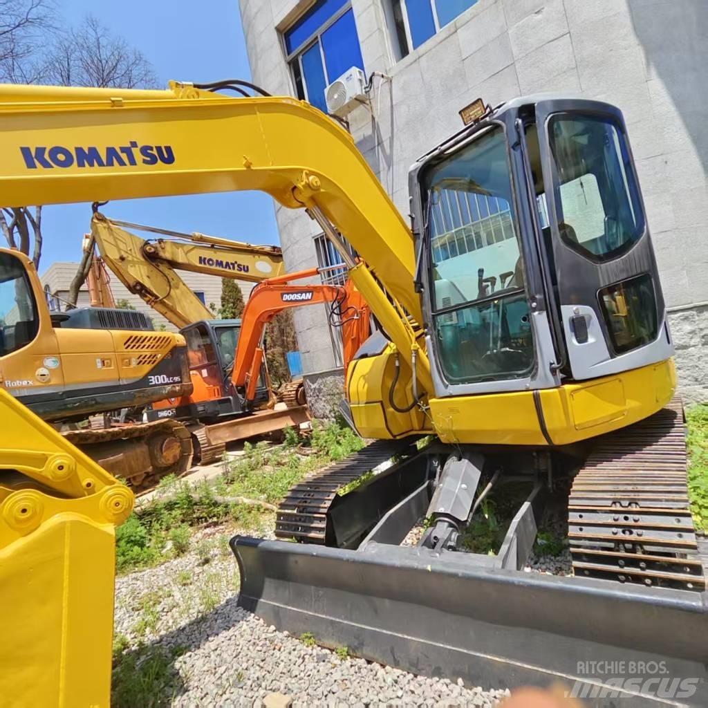 Komatsu pc78 حفارات زحافة