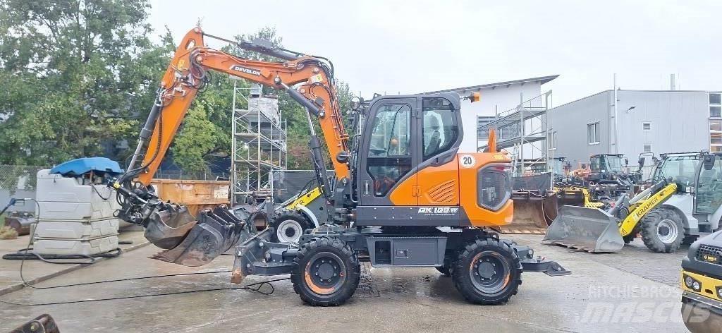 Doosan DX 100 W-7 حفارات بعجل