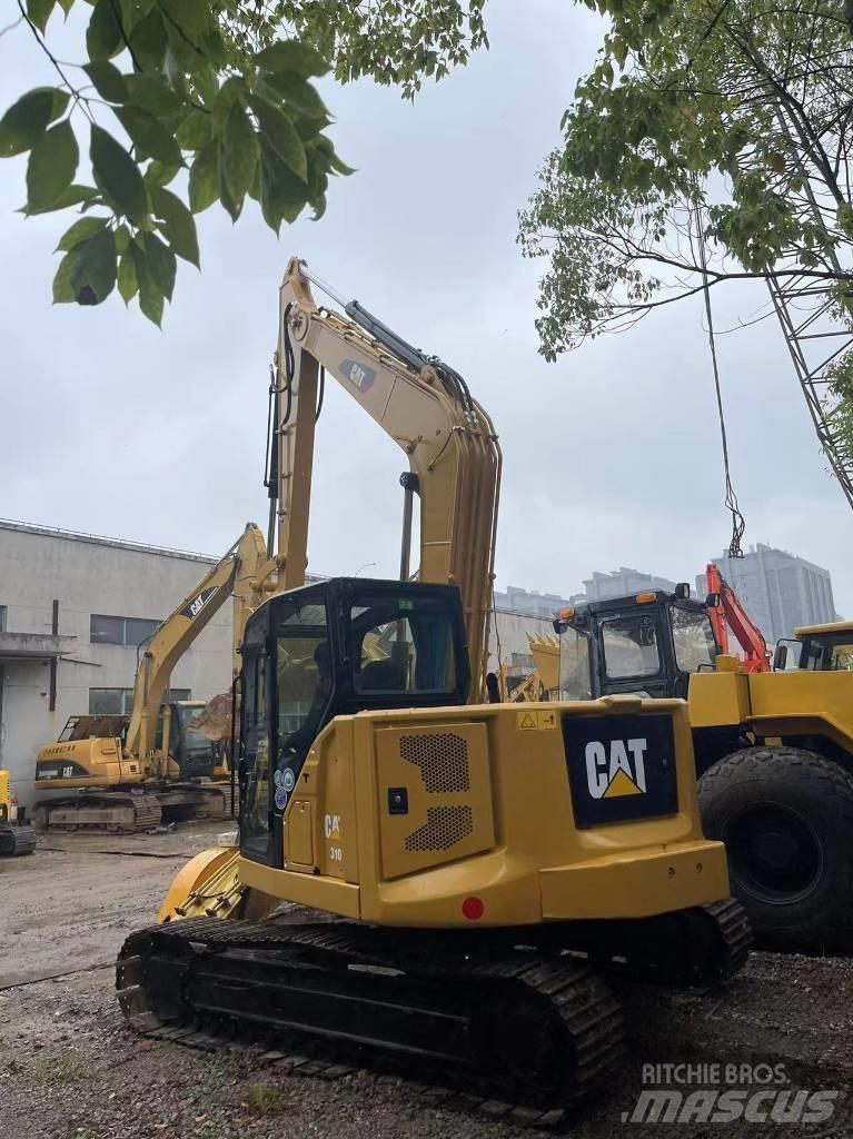 CAT 310 حفارات زحافة