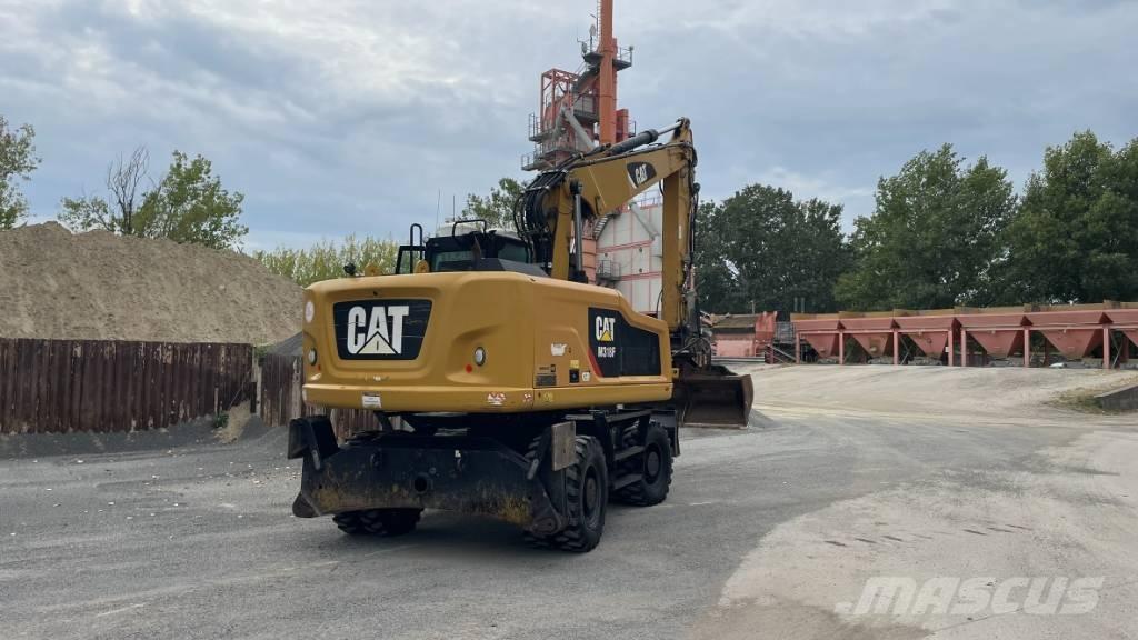 CAT M 318 F لوادر ذات جرافات عكسية