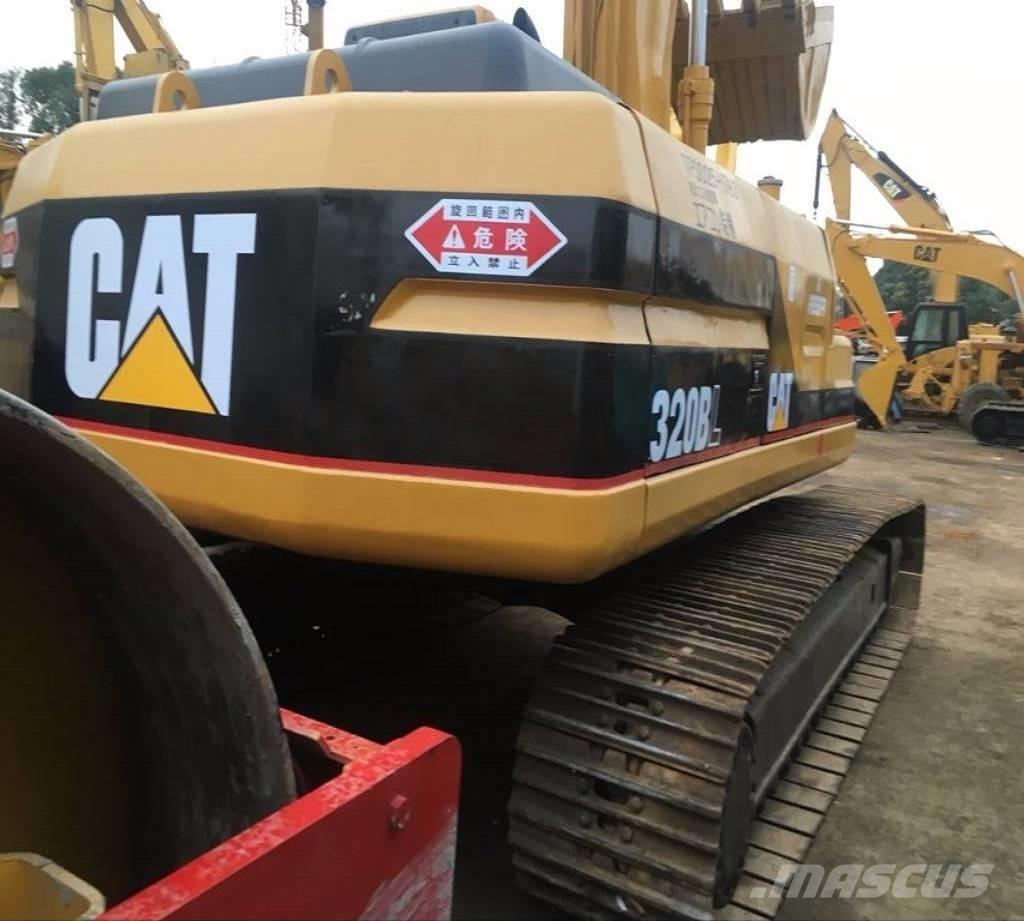 CAT 320 B حفارات زحافة