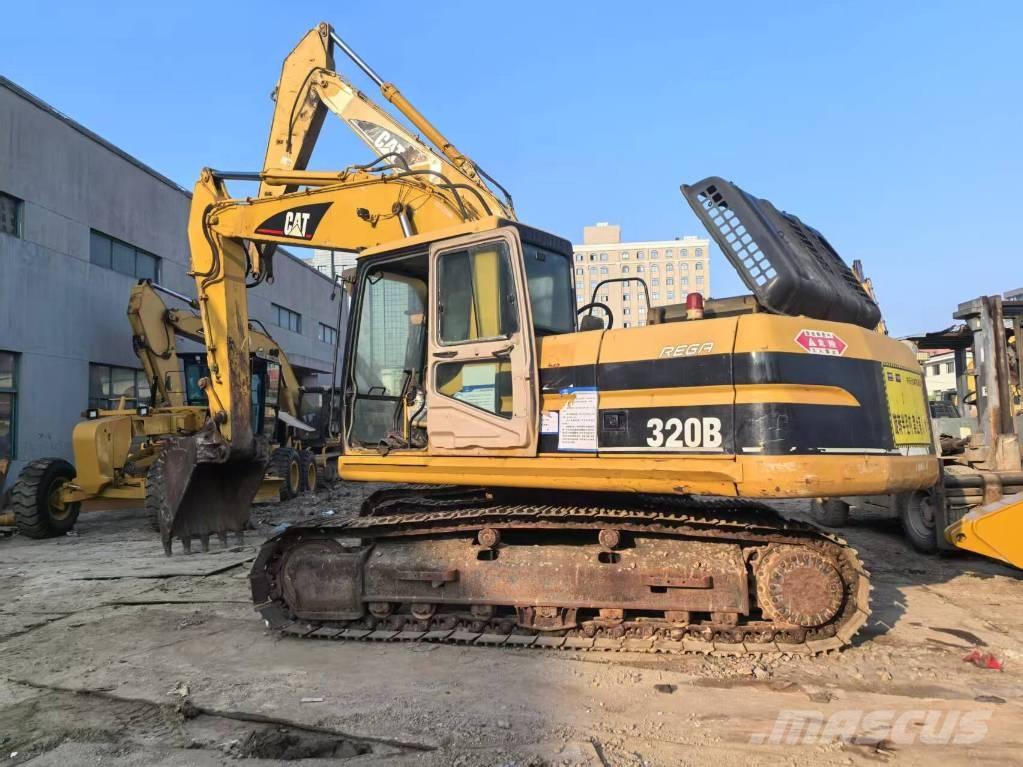 CAT 320BL حفارات زحافة