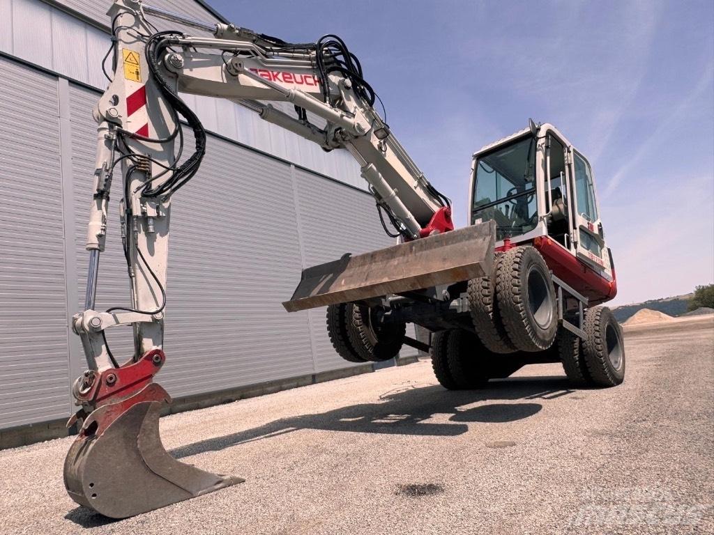 Takeuchi TB 175 W حفارات بعجل