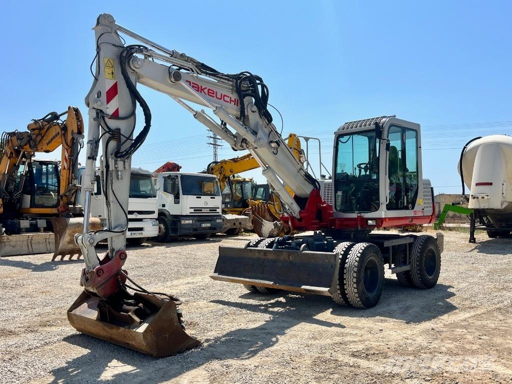 Takeuchi TB 175 W حفارات بعجل