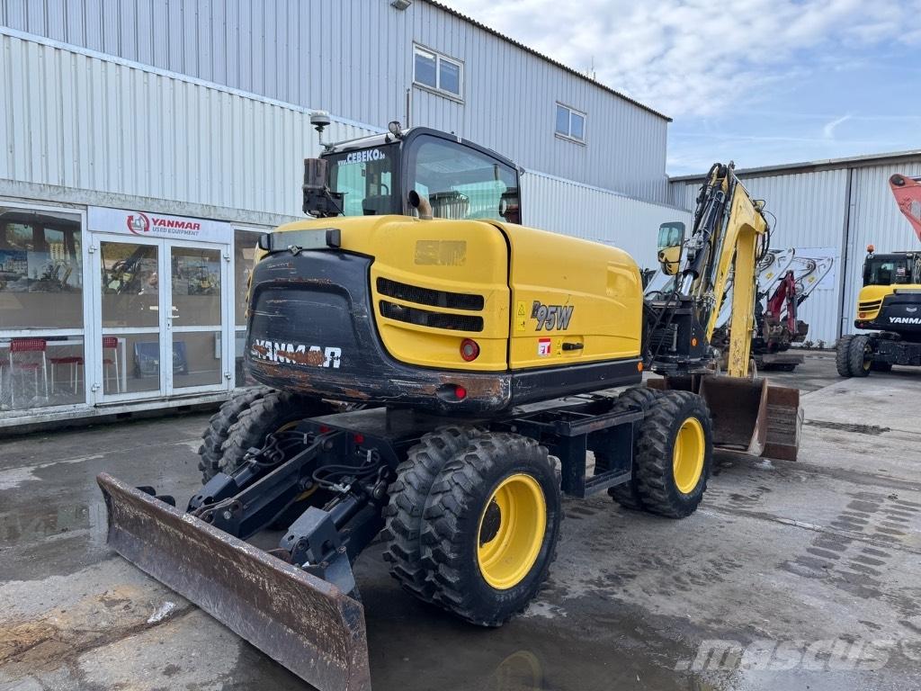 Yanmar B95W (40810) حفارات بعجل