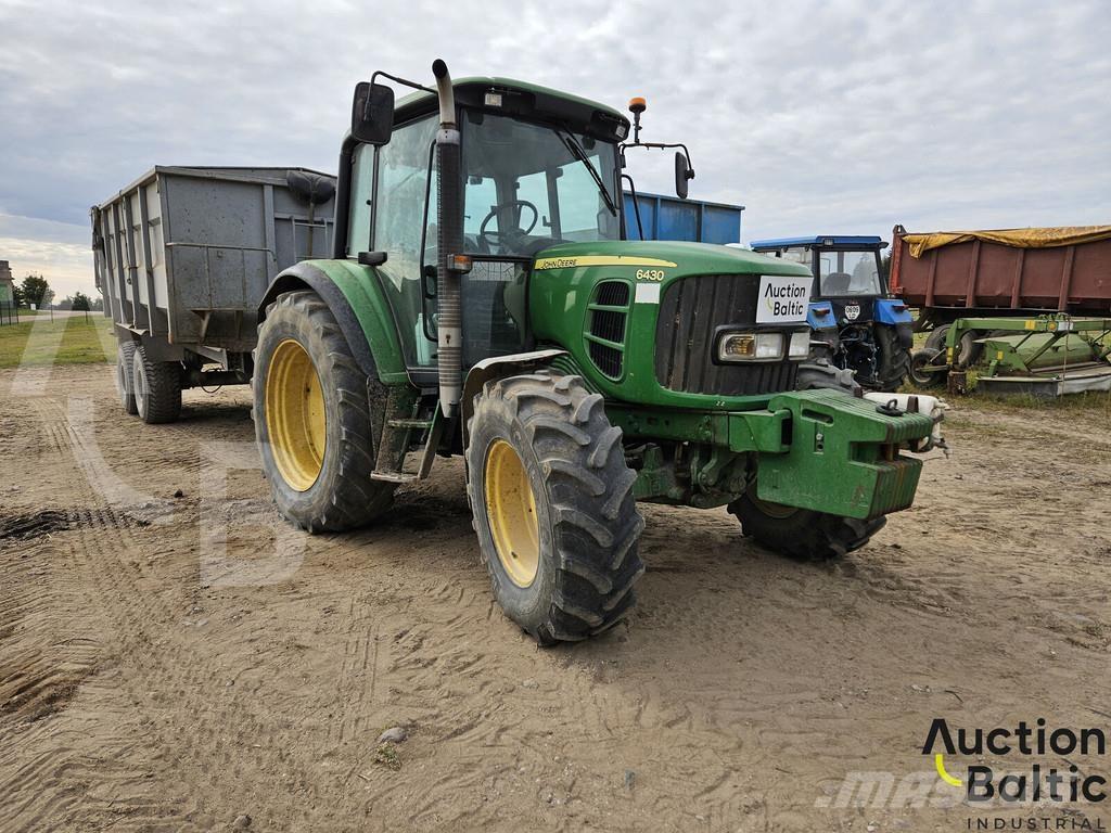 John Deere 6430 الجرارات
