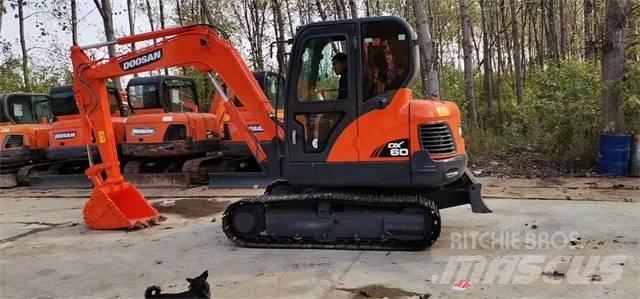 Doosan DX 60 حفارات صغيرة أقل من 7 طن (حفارات صغيرة)