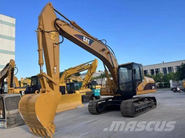 CAT 320 C حفارات زحافة