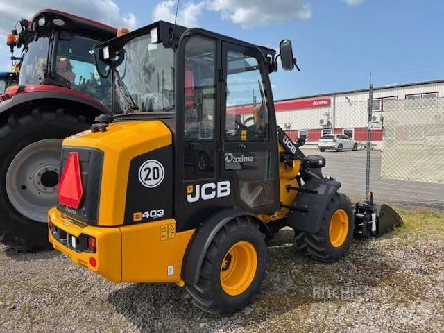 JCB 403 لوادر انزلاقية التوجيه