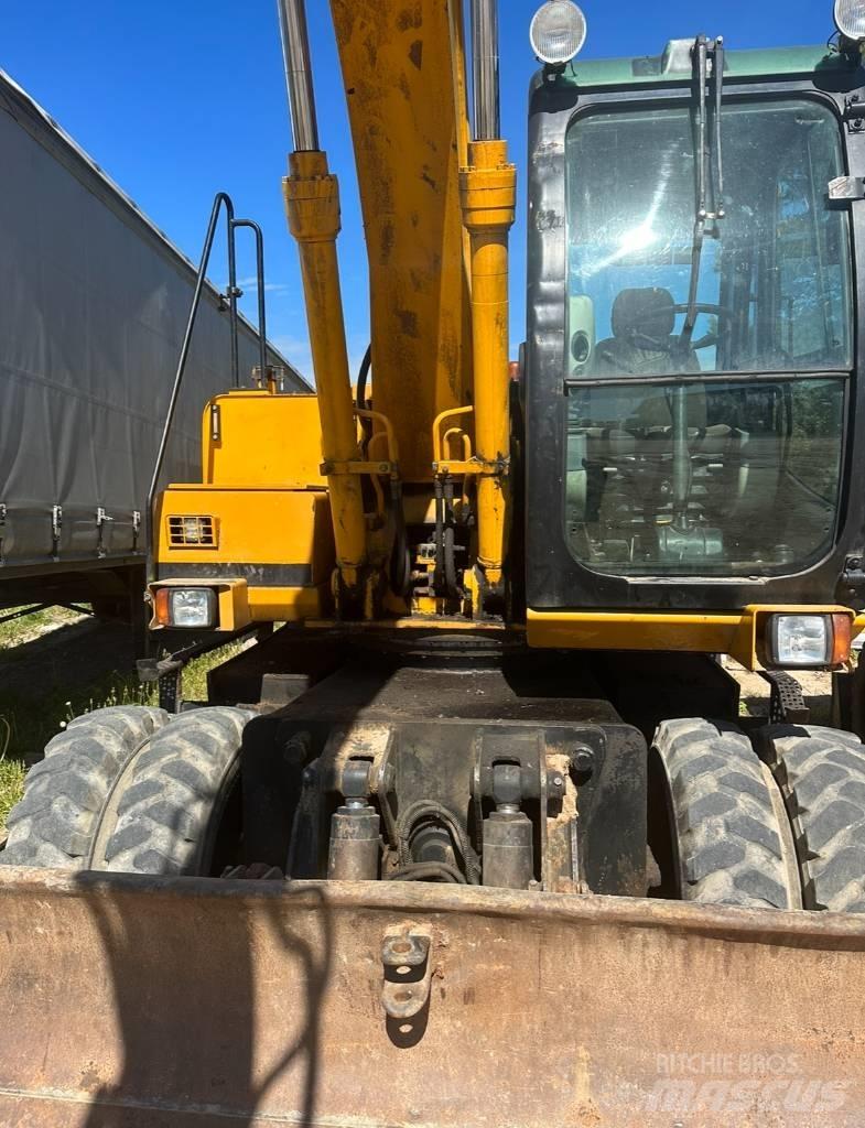 JCB JS 145 W حفارات بعجل