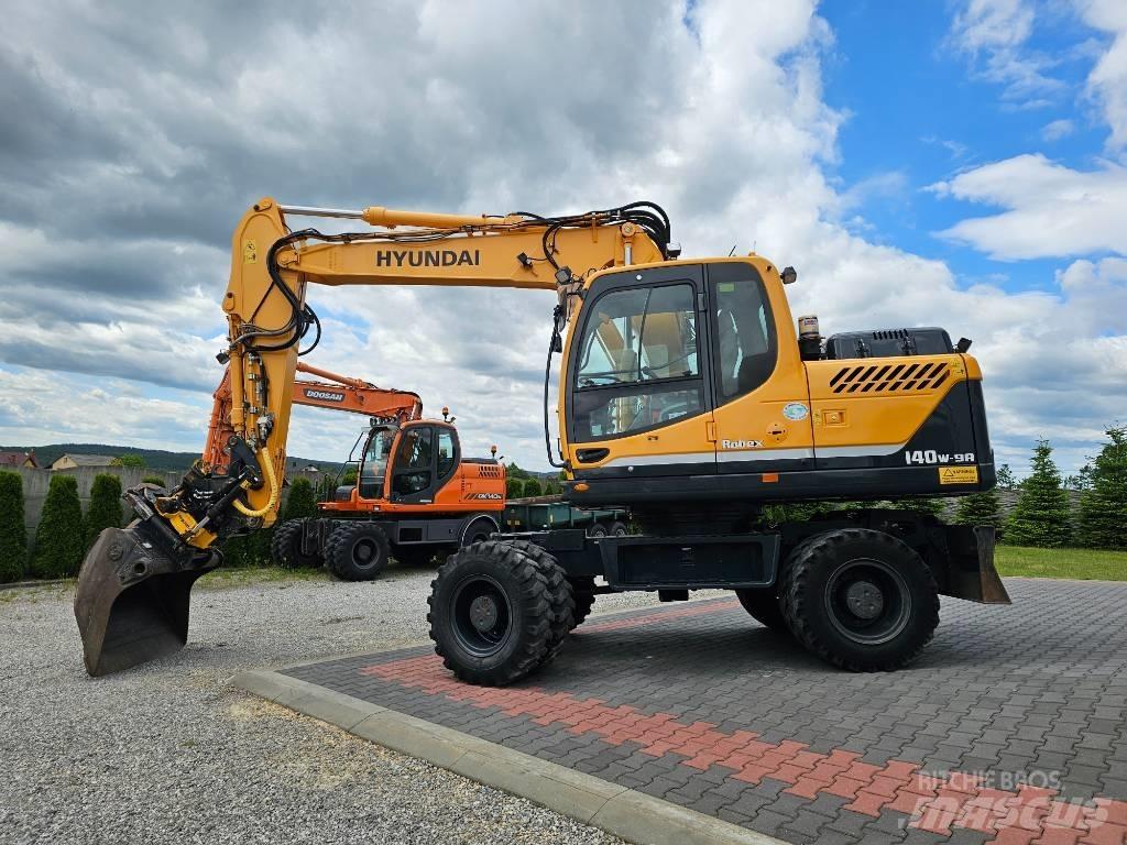 Hyundai 140 W 9 A حفارات بعجل