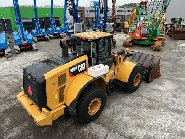 CAT 966 M لوادر بعجل