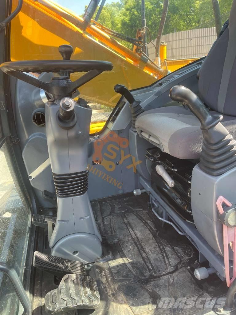 Hyundai 210W-9 حفارات بعجل