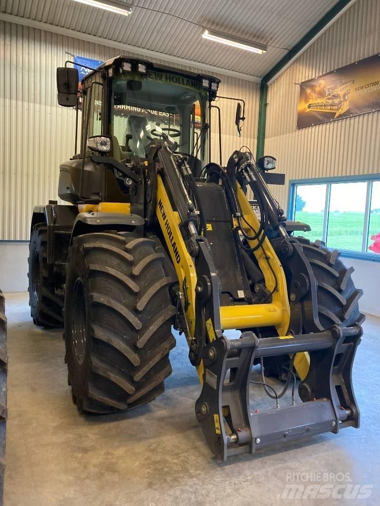 New Holland W 110 لوادر بعجل