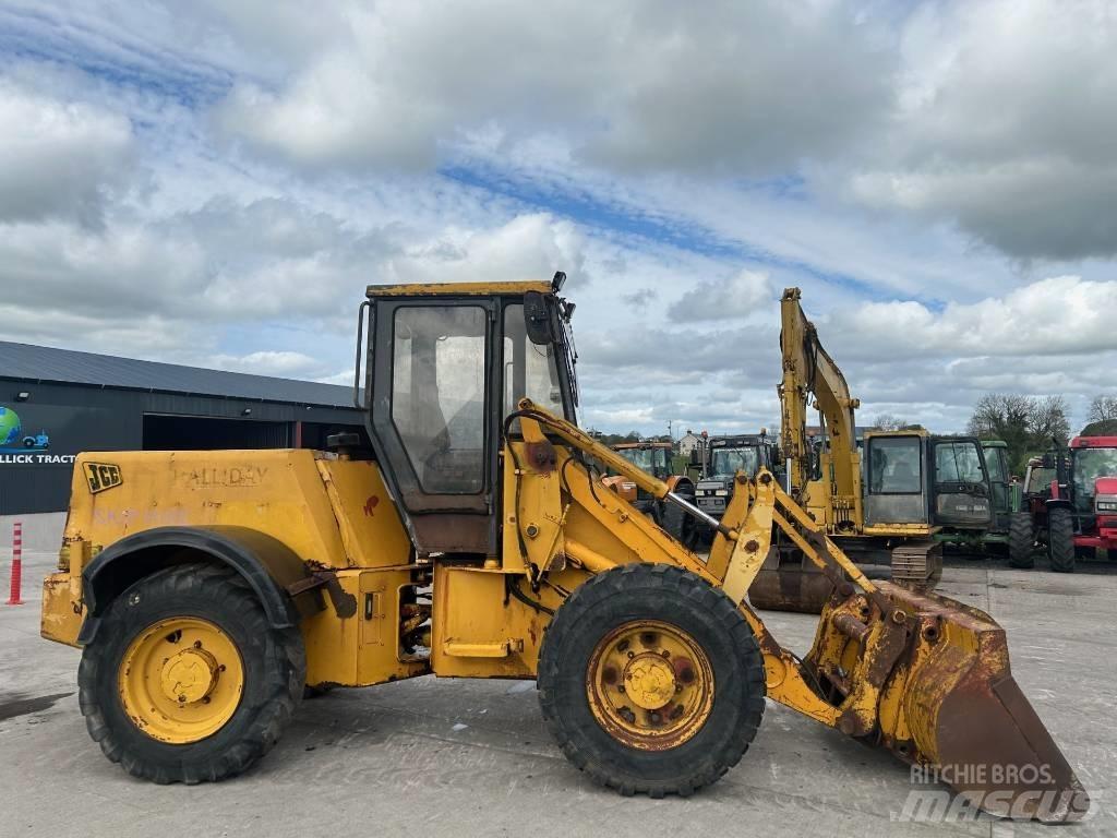 JCB 410 لوادر بعجل