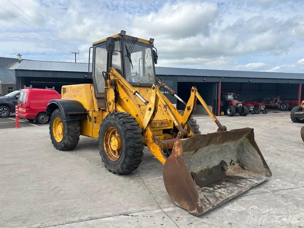 JCB 410 لوادر بعجل
