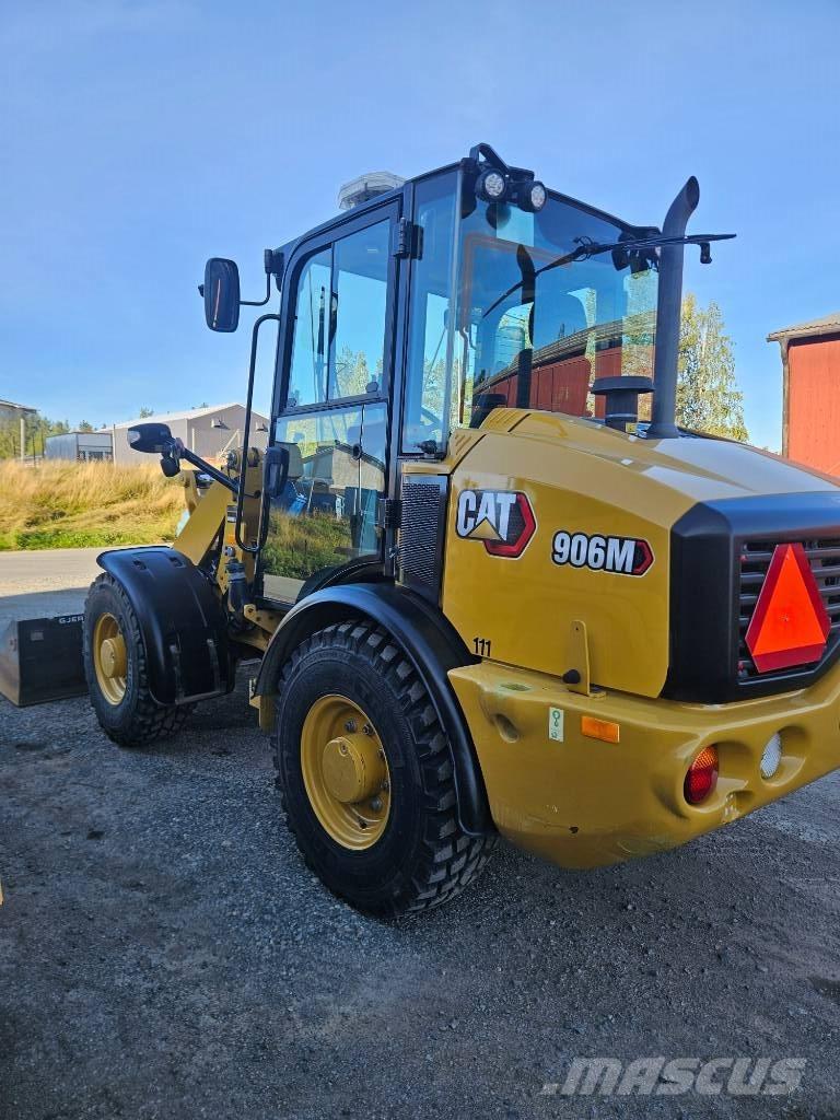 CAT 906 لوادر بعجل