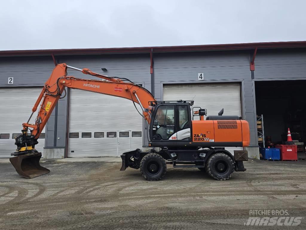 Hitachi ZX 220W-5 حفارات بعجل