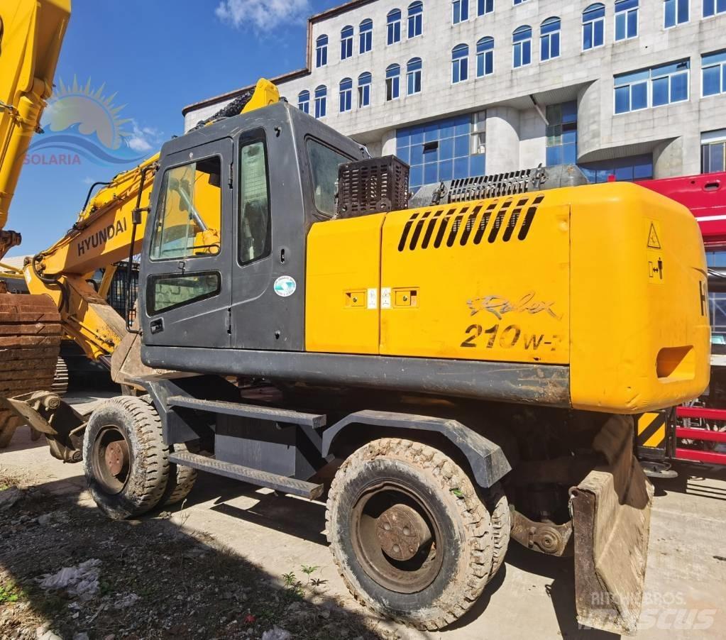 Hyundai R210W-7 حفارات بعجل