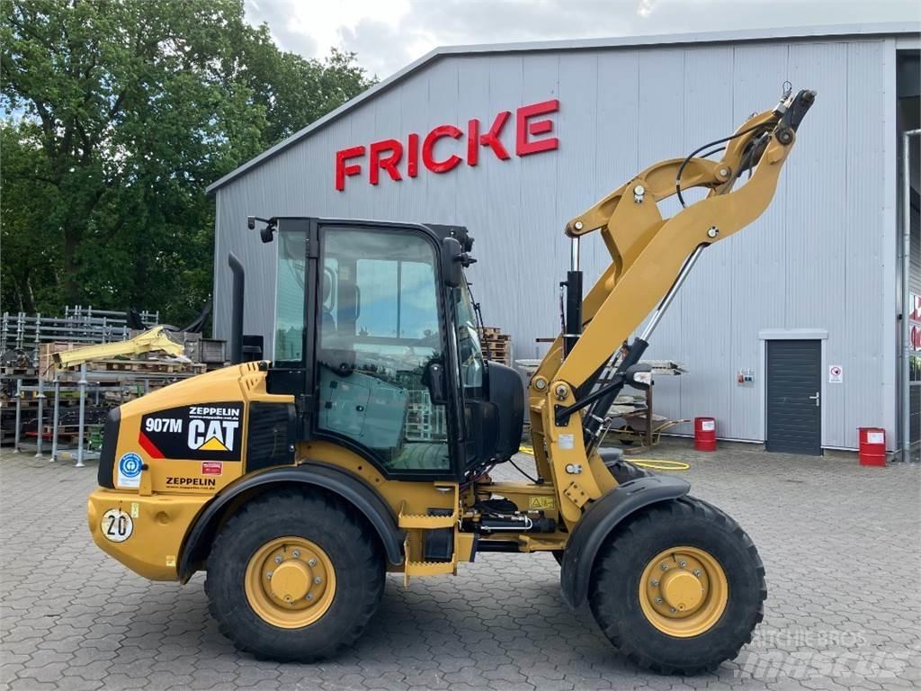 CAT 907 لوادر بعجل
