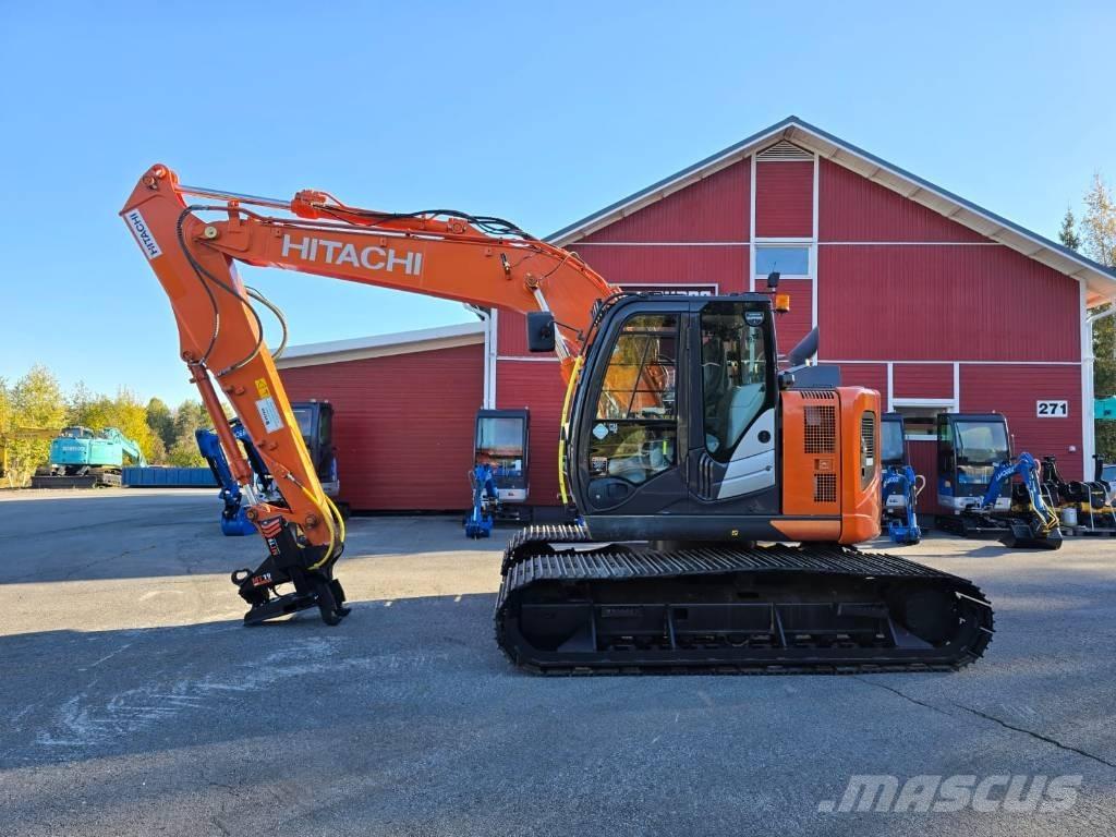 Hitachi ZX 135 US-6 حفارات زحافة