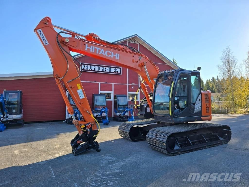 Hitachi ZX 135 US-6 حفارات زحافة
