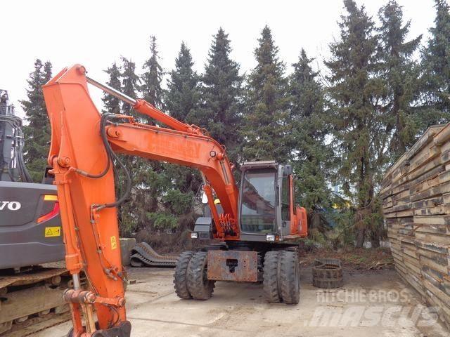 Hitachi ZX 160 W حفارات بعجل