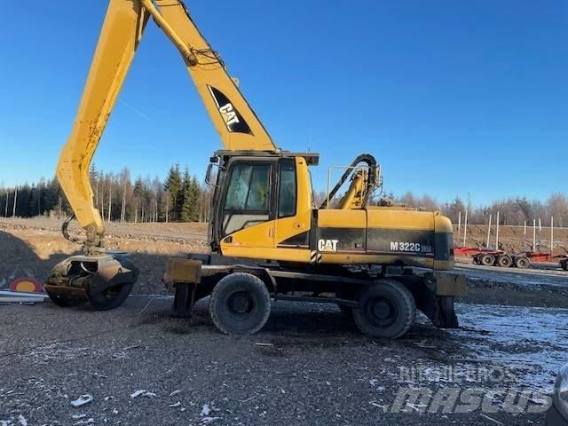 CAT M 322 C MH حفارات بعجل