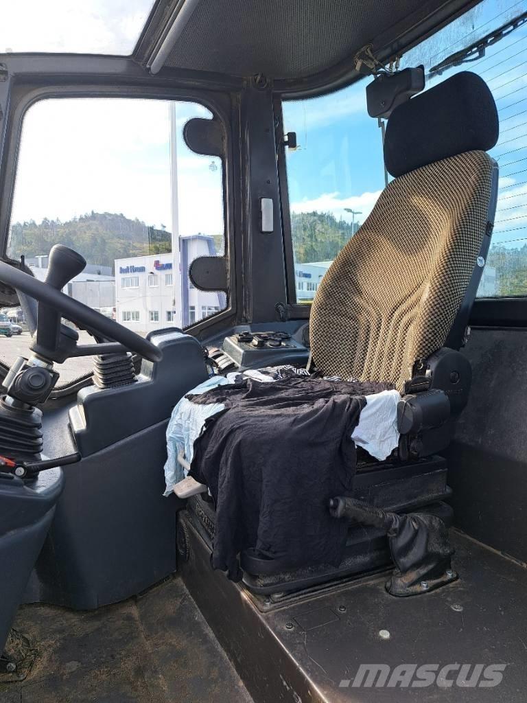 Hitachi ZW 75 لوادر بعجل