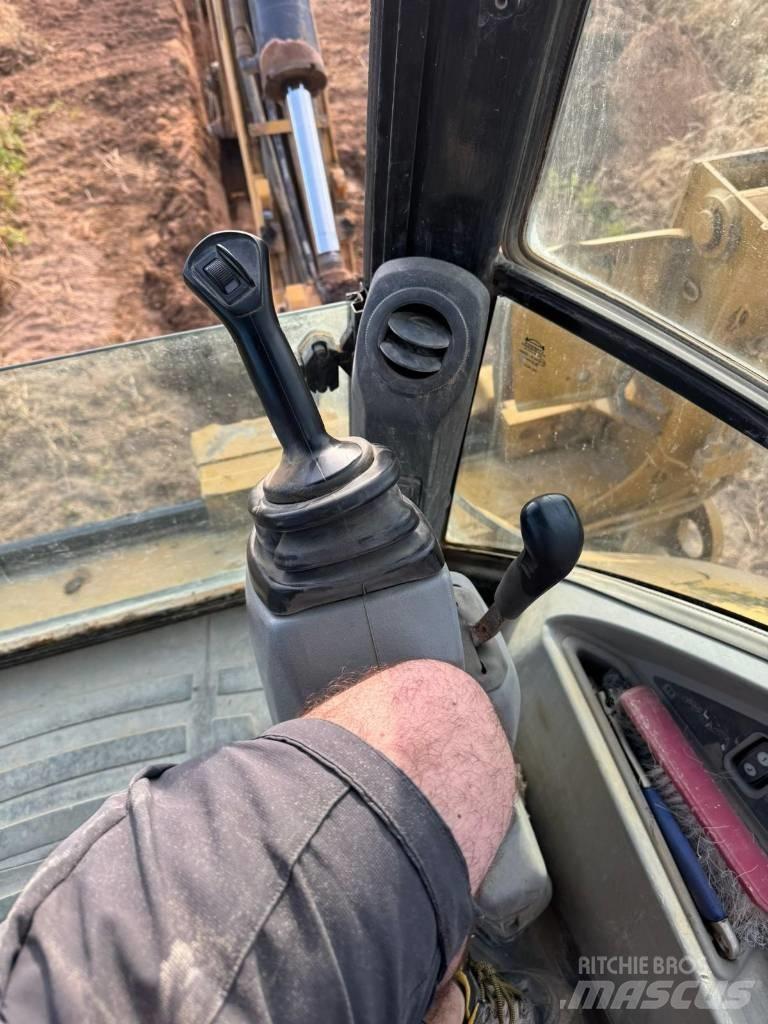 CAT 432 E لوادر ذات جرافات عكسية