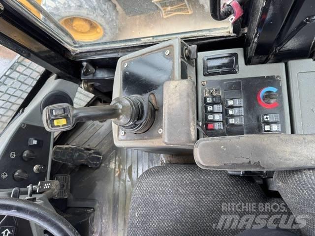 CAT 930 H لوادر بعجل