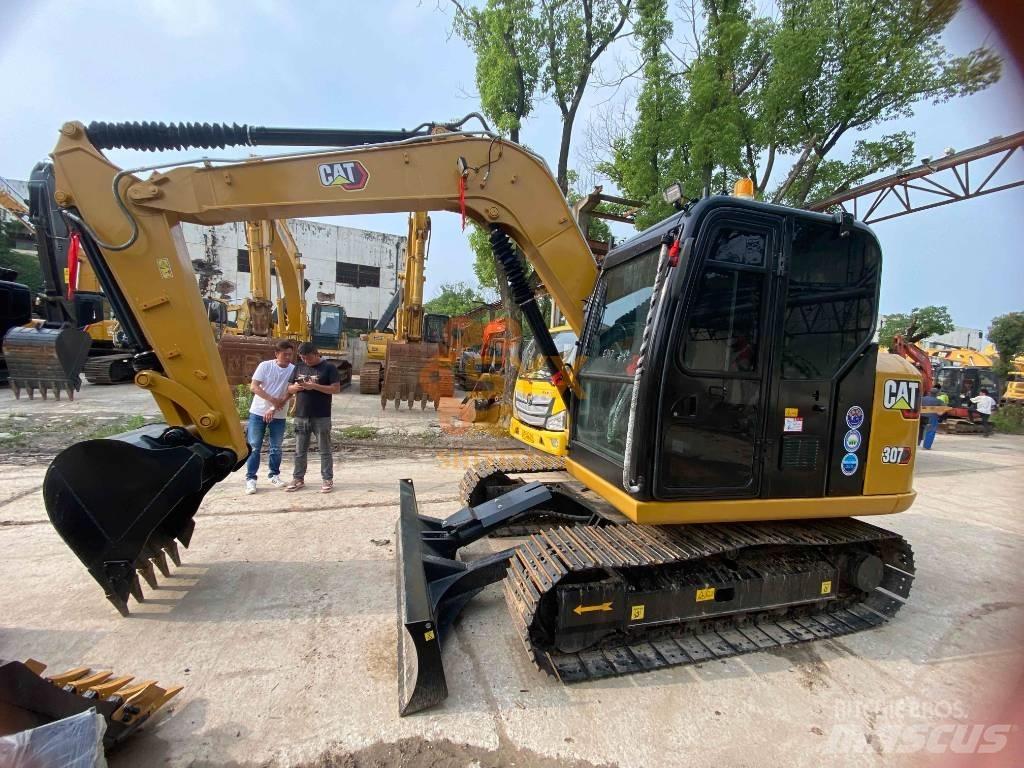 CAT 307 E حفارات وسط 7 طن - 12 طن