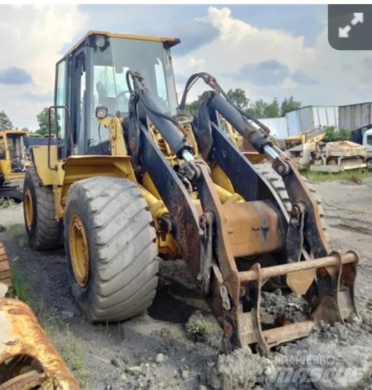 CAT IT 62 G لوادر بعجل