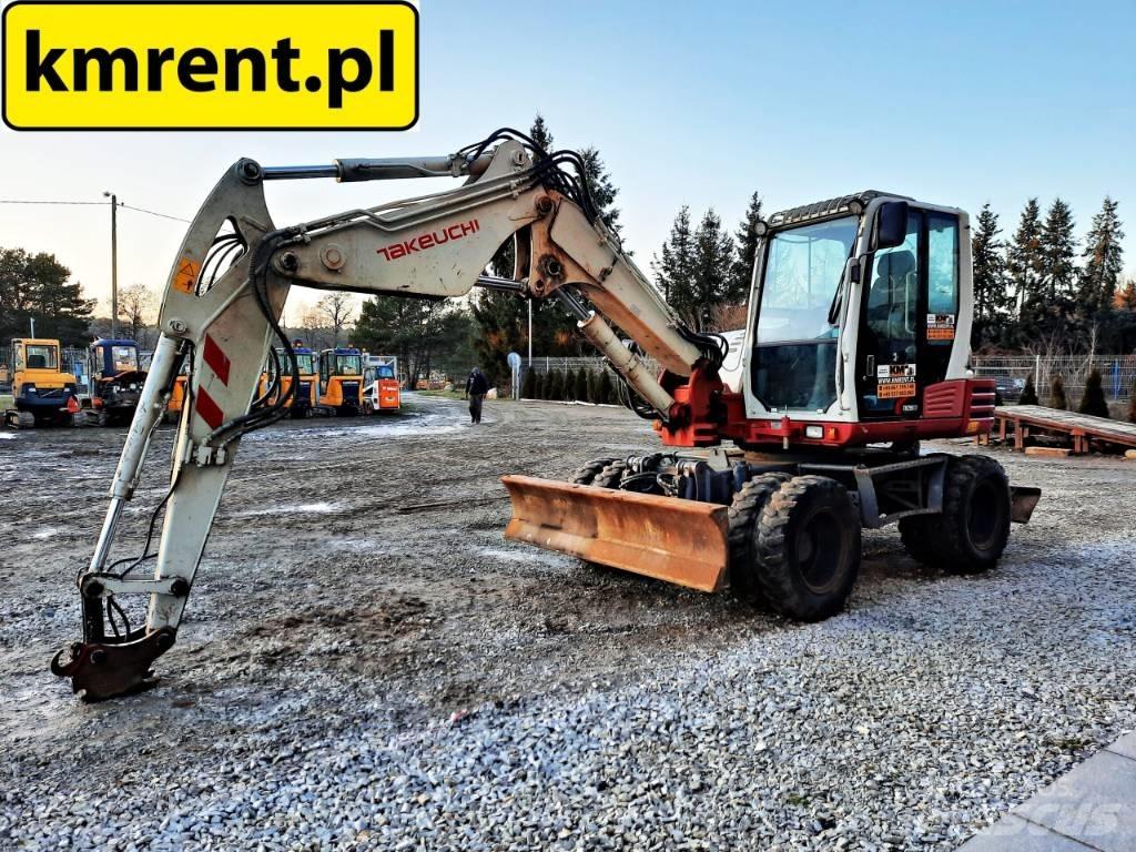 Takeuchi TB 295 حفارات بعجل