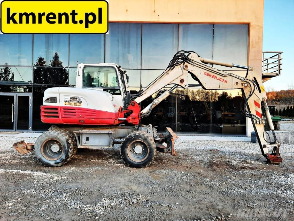 Takeuchi TB 295 حفارات بعجل