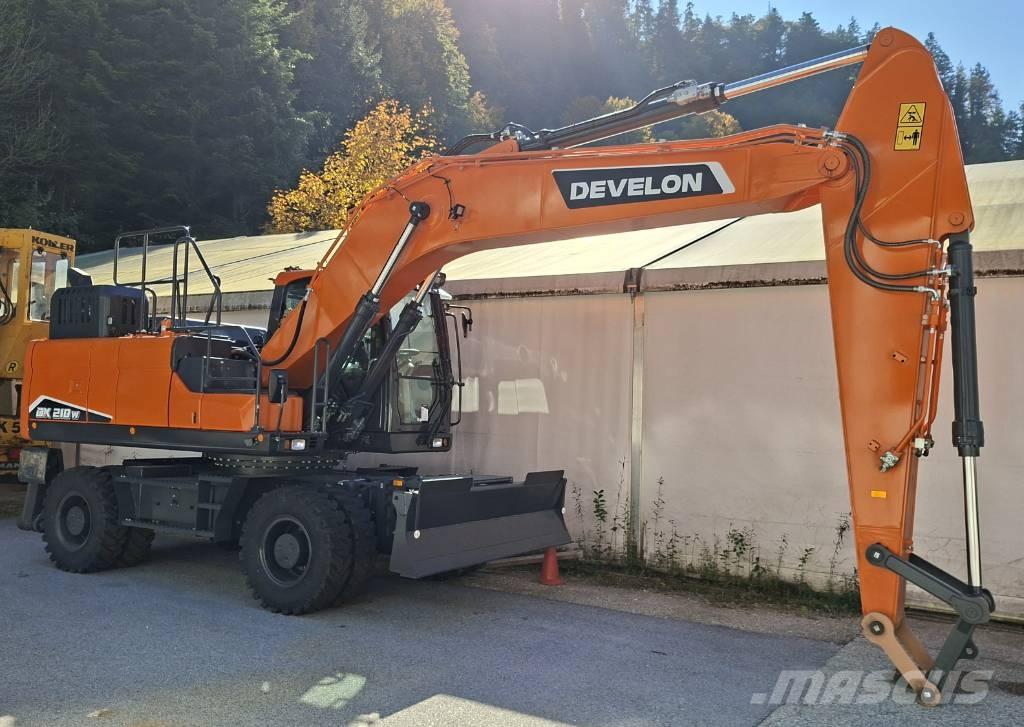 Develon DX 210 W-7 حفارات بعجل