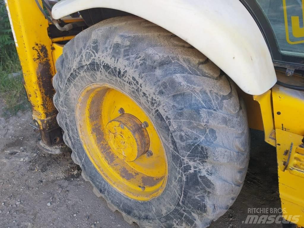 JCB 4 CX لوادر ذات جرافات عكسية