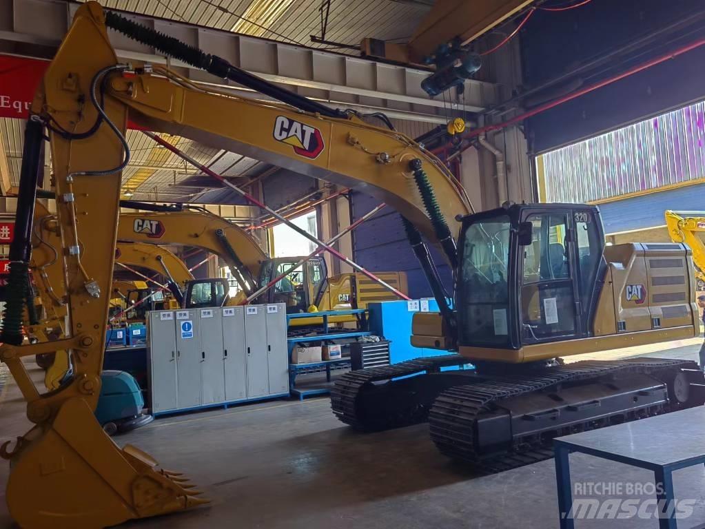 CAT 2021 CAT 320 حفارات بعجل