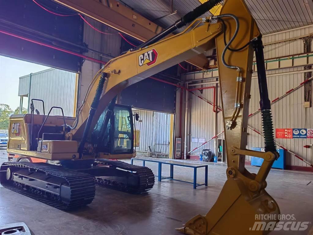 CAT 2021 CAT 320 حفارات بعجل