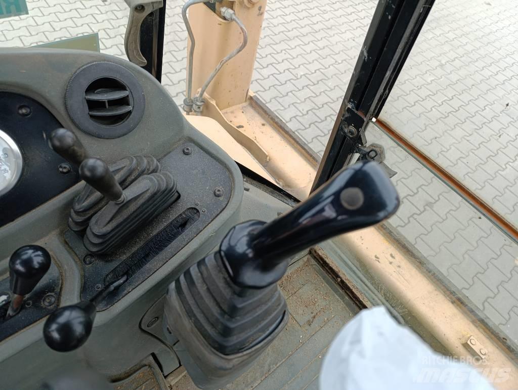 CAT 428 D لوادر ذات جرافات عكسية